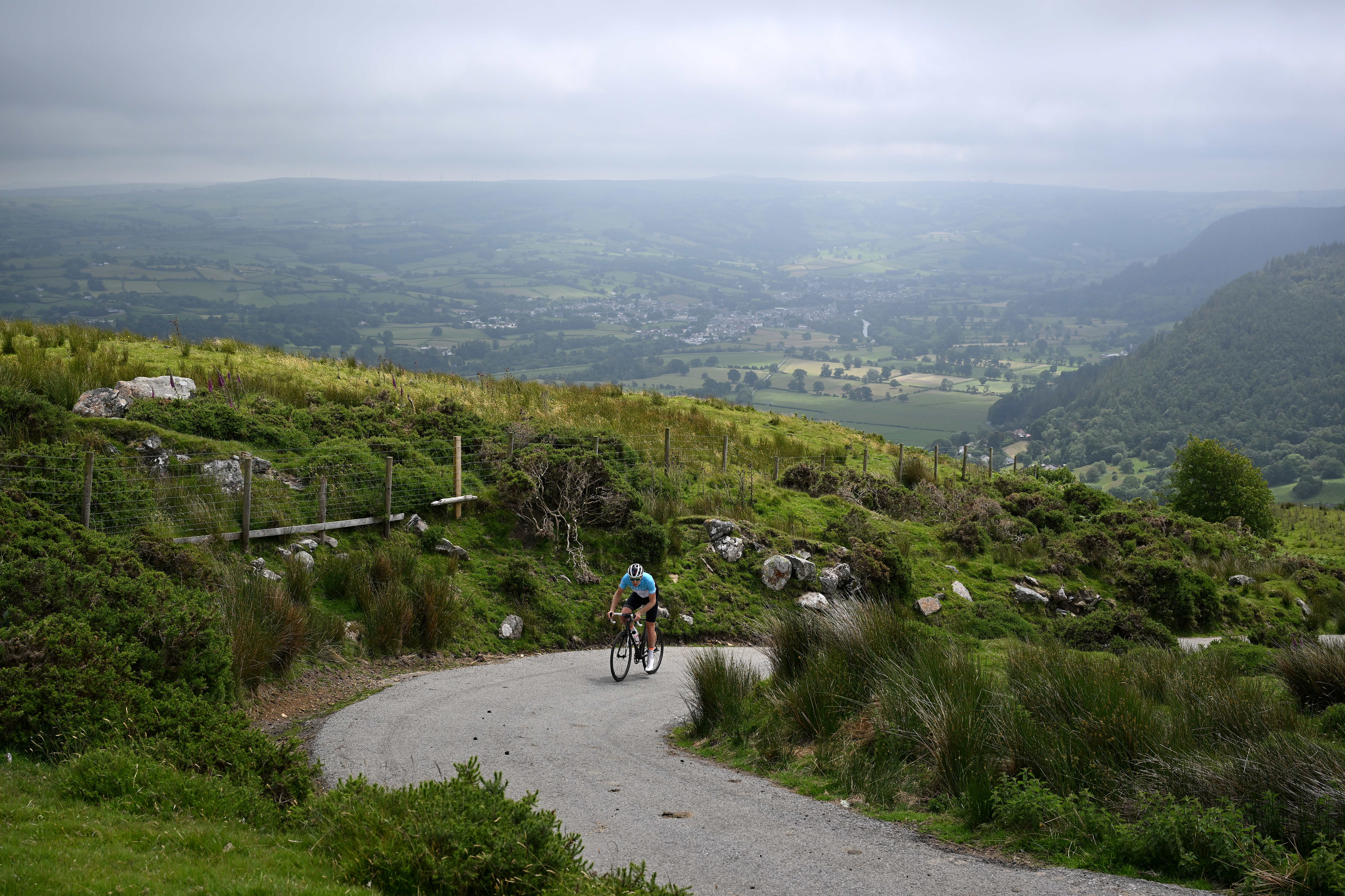 climbing steep hill hard work working country summer