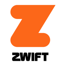 The Zwift Ride with KICKR CORE 2 side on with orange background